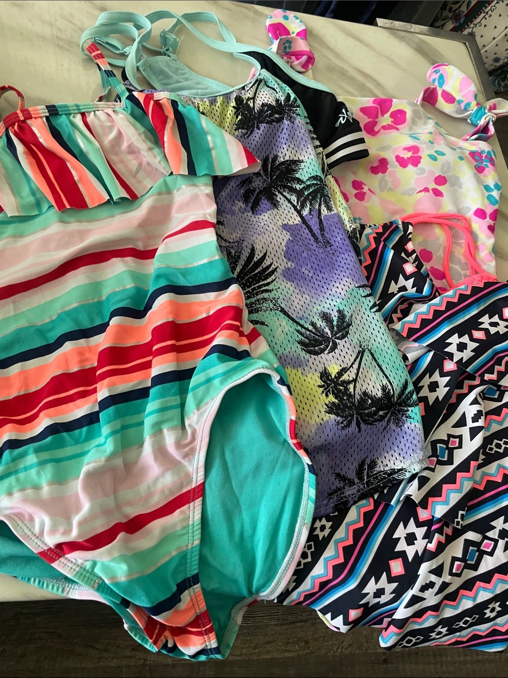 Girls Bikini top and one piece bundle from medium to XL or 14.